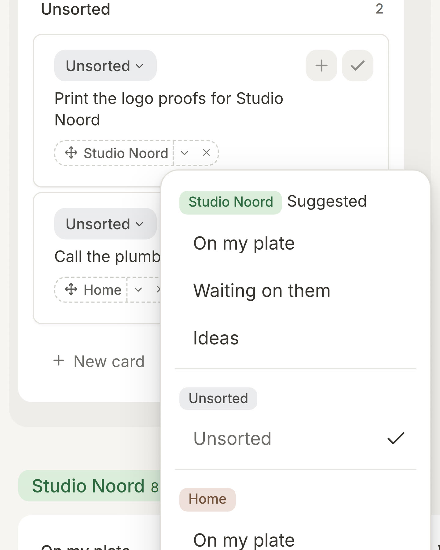 A new card in Unsorted with its suggested project opened as a list, the suggestion at the top