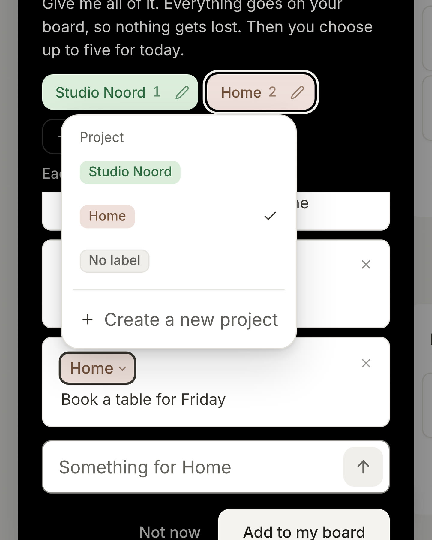 The brain dump with three things typed. The project pill on the last card is pressed: a list opens with every project, No label and Create a new project